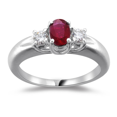 0.25 Cts Diamond & 0.50 Cts Ruby Three Stone Ring in 18K White Gold