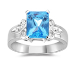 0.10 Ct Diamond & 2.75 Ct 9x7 mm AAA Swiss Blue Topaz Ring in 14KW Gold