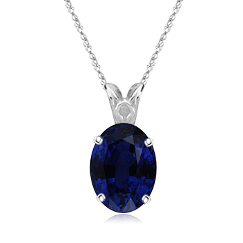 0.70 Cts of 6x4 mm Oval AA Blue Sapphire Scroll Pendant in Platinum