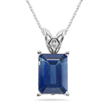 1.13 Ct 7x5 mm AA Emerald Cut Blue Sapphire Scroll Pendant - 14KW Gold