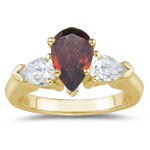 0.20 Cts Diamond & 5.02 Cts Garnet Three Stone Ring in 18K Yellow Gold