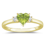0.10 Cts Diamond & 0.25 Cts Peridot Classic Three Stone Ring in 18K Yellow Gold