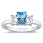 0.33 Cts Diamond & 3.24 Cts Swiss Blue Topaz Three Stone Ring in Platinum