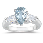 0.20 Cts Diamond & 4.55 Cts Sky Blue Topaz Three Stone Ring in 14K White Gold